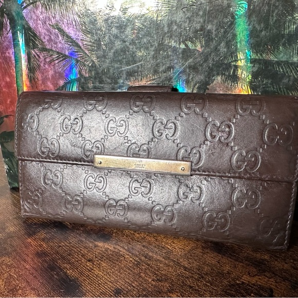 Gucci Handbags - Authentic Gucci Brown Leather Embossed Long Wallet